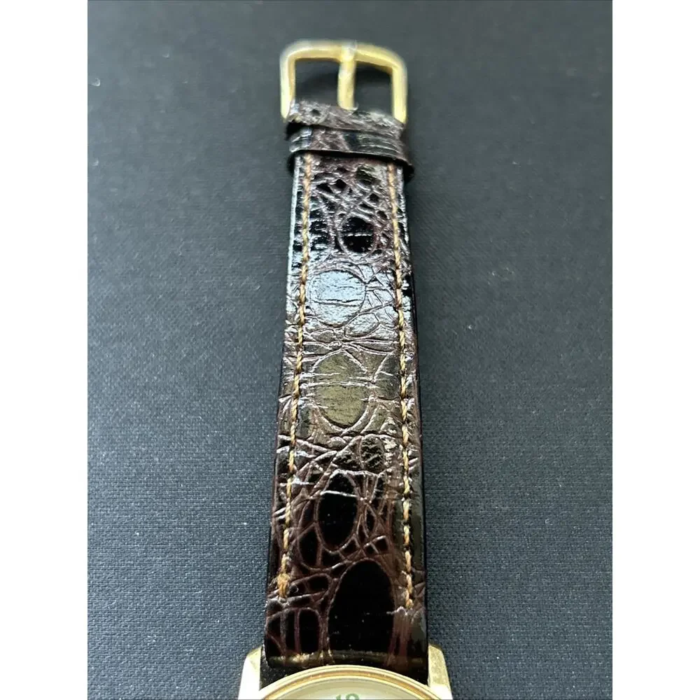 WCI Gold Tone White Dial Women’s Quartz Watch